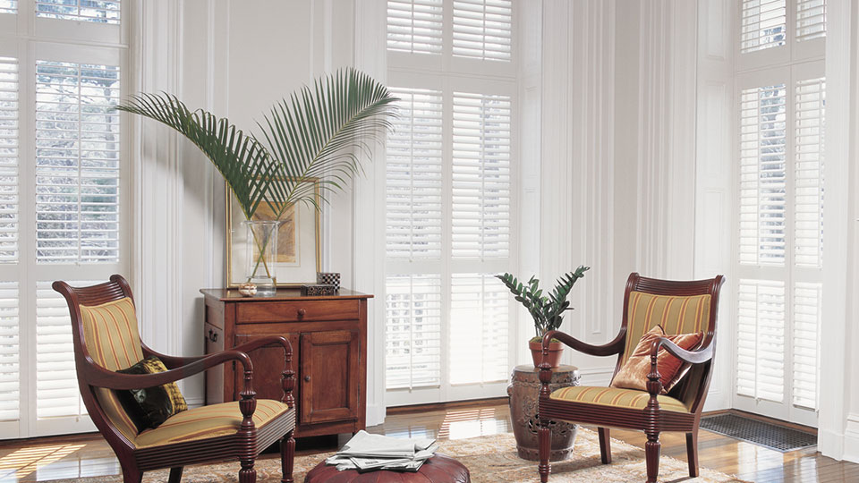 Home interior composite/faux shutters with sun shinning through